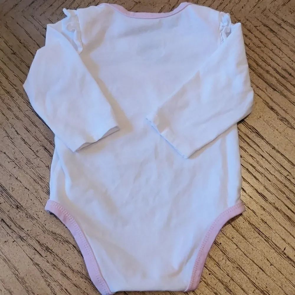 0-3 month long sleeve onsie. First Impressions.